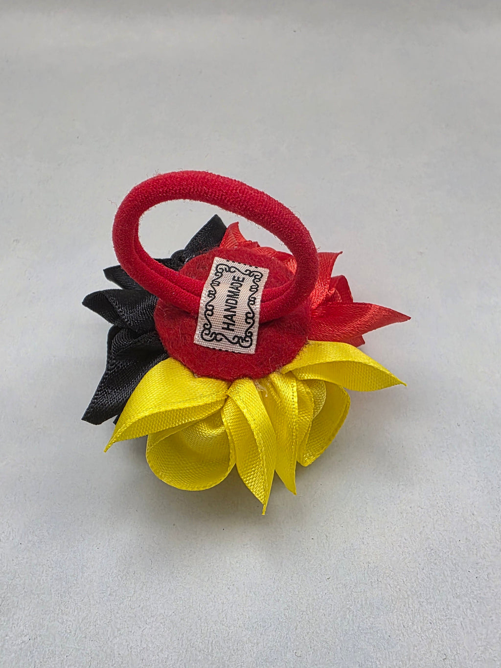 Fanblüte Schwarz-Rot-Gold Haarschleife